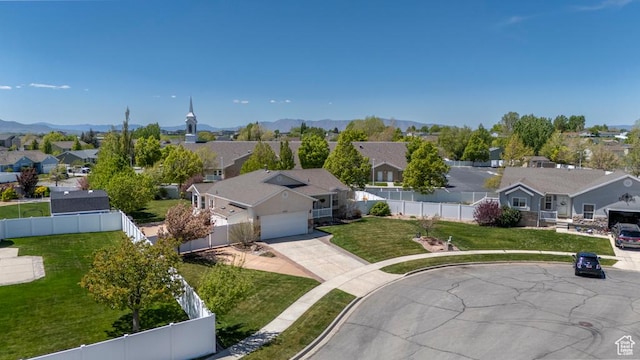 aerial perspective of suburban area featuring a mountainous background