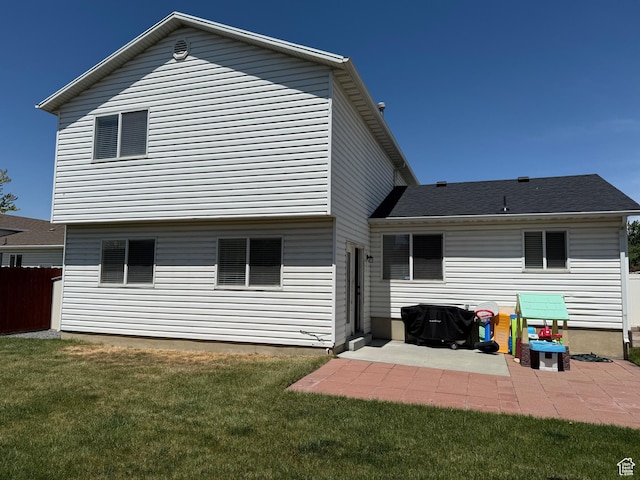 back of property with a patio area