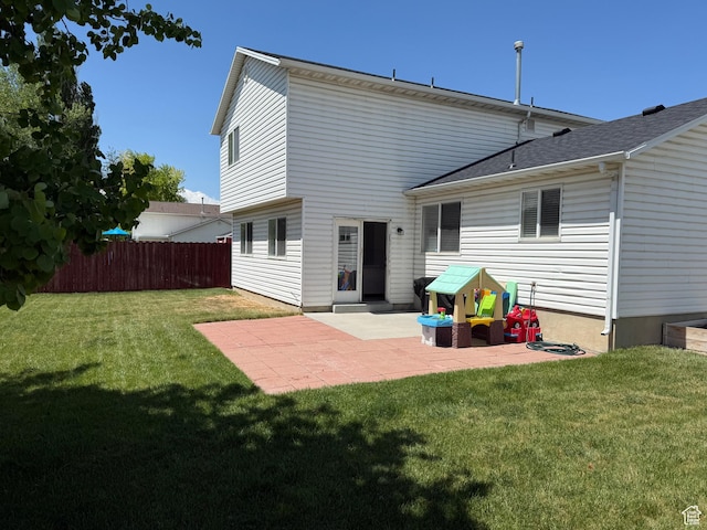 rear view of house with a patio