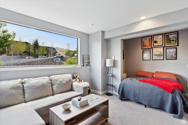 carpeted bedroom with baseboards and recessed lighting