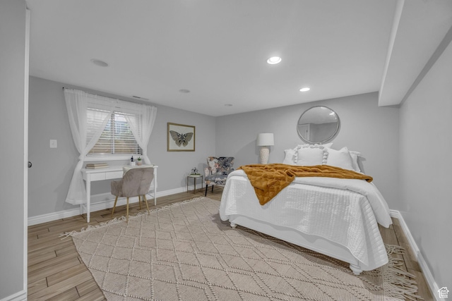 bedroom featuring recessed lighting, baseboards, and wood finished floors