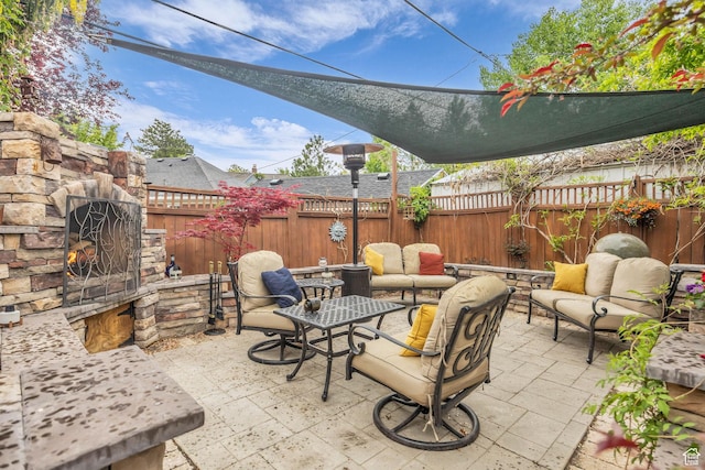view of patio / terrace featuring outdoor lounge area and a fenced backyard