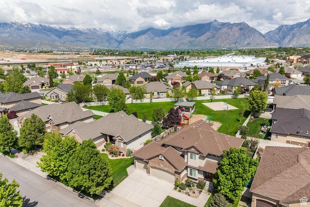 aerial view of residential area with a mountainous background