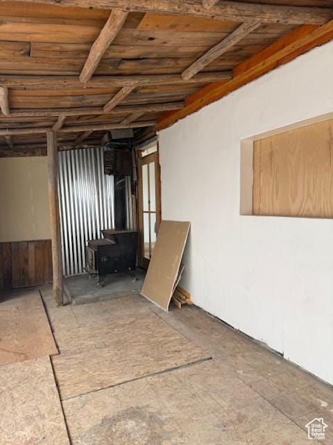 basement featuring wooden ceiling