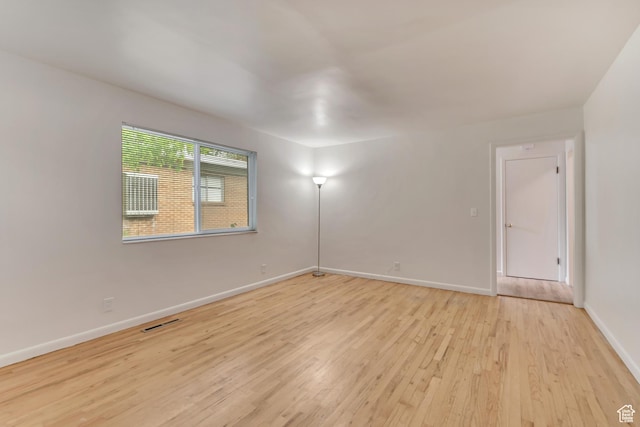 3410 S 2000 E, Millcreek, UT 84109 - empty room with light wood-type flooring and baseboards