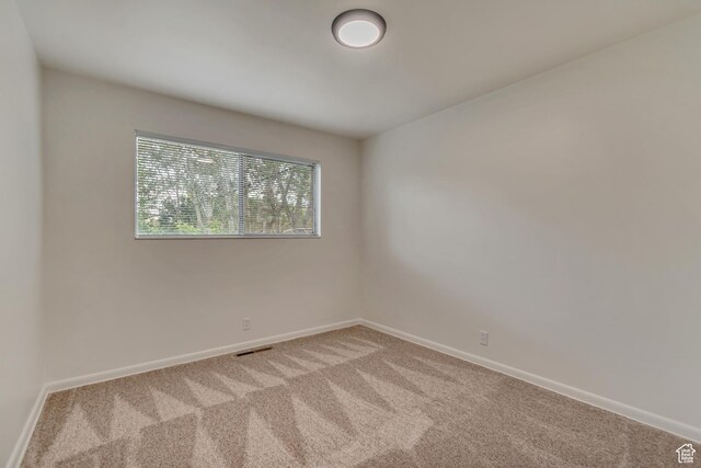 3410 S 2000 E, Millcreek, UT 84109 - empty room with carpet floors and baseboards