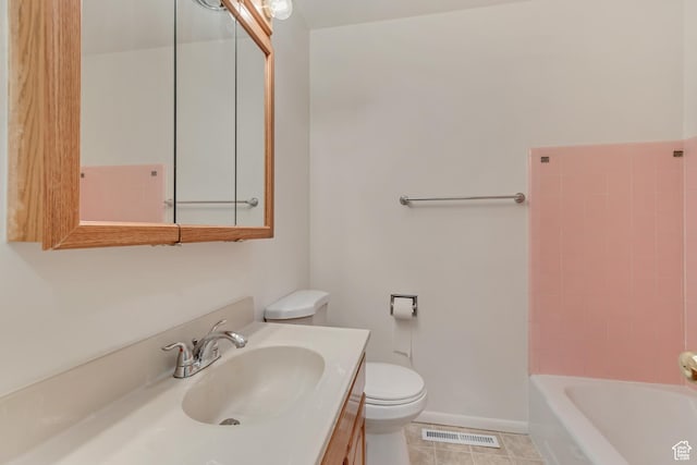 3410 S 2000 E, Millcreek, UT 84109 - full bathroom featuring toilet, vanity, tile patterned floors, and baseboards