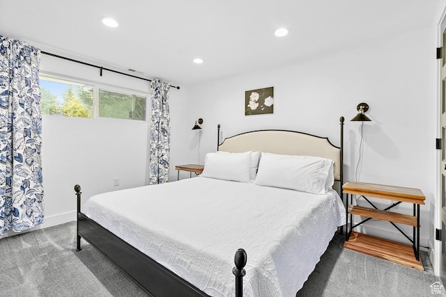 carpeted bedroom featuring recessed lighting and baseboards