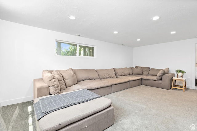 living area with carpet flooring, recessed lighting, and baseboards