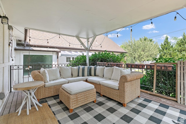 deck with an outdoor hangout area