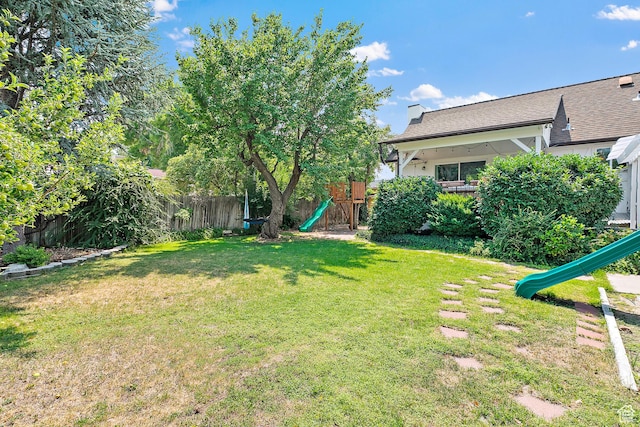 view of yard with a playground