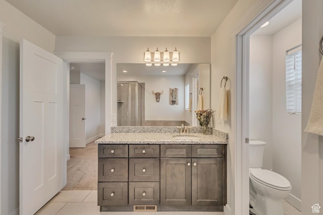 341 N 100 W, Morgan, UT 84050 - full bathroom featuring tile patterned floors, toilet, vanity, a chandelier, and a shower with door