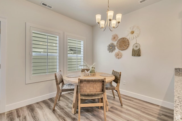 341 N 100 W, Morgan, UT 84050 - dining room featuring baseboards, a chandelier, and light wood finished floors