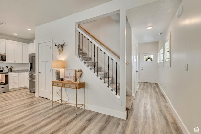 341 N 100 W, Morgan, UT 84050 - stairway with wood finished floors, recessed lighting, and baseboards