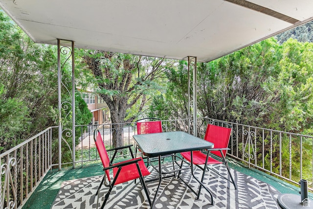 balcony featuring outdoor dining space