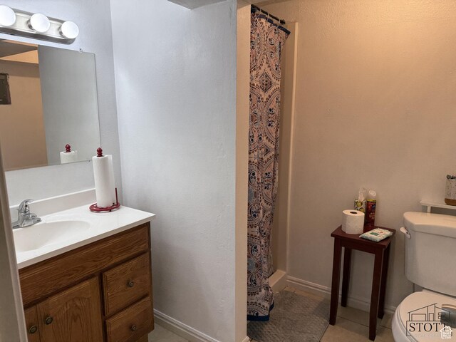 380 N 100 W, Spanish Fork, UT 84660 - bathroom with toilet, vanity, tile patterned floors, and curtained shower