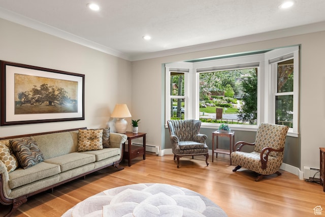 living area featuring a baseboard radiator, wood finished floors, recessed lighting, ornamental molding, and baseboards