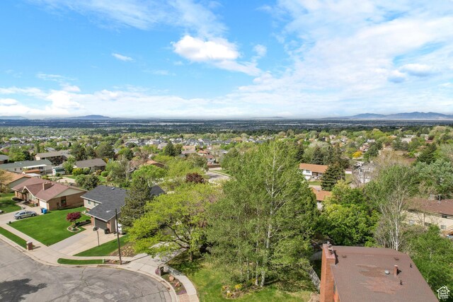 aerial perspective of suburban area featuring a mountainous background