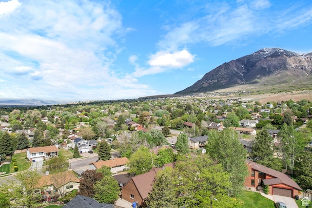 aerial perspective of suburban area with a mountainous background