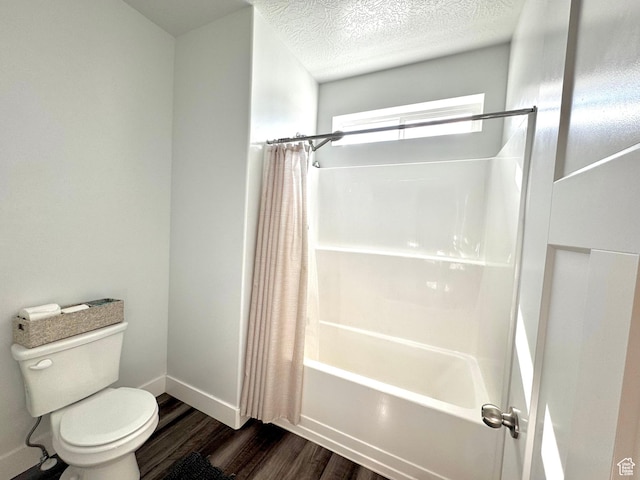 316 W 435 N, Vineyard, UT 84059 - bathroom with wood finished floors, shower / bath combination with curtain, toilet, baseboards, and a textured ceiling