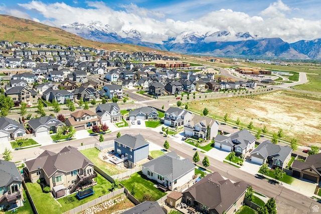 aerial perspective of suburban area featuring a mountain backdrop