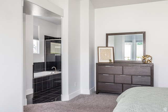 carpeted bedroom with baseboards