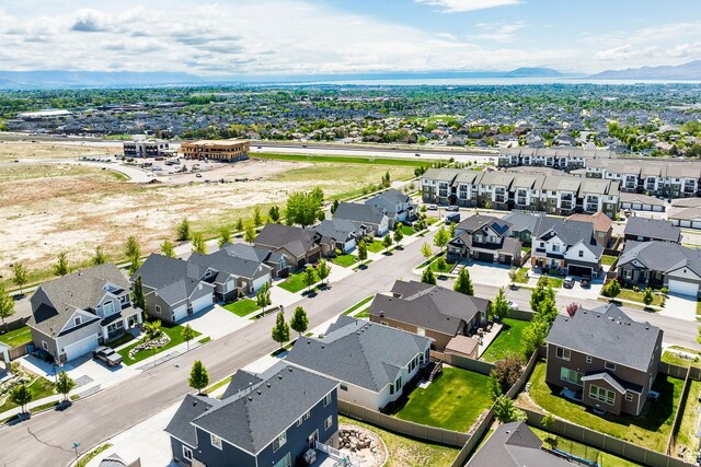 aerial perspective of suburban area with a mountain backdrop