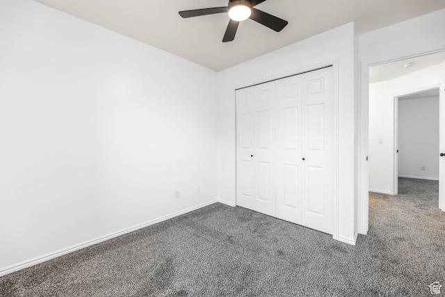 1888 W 1520 N, Clinton, UT 84015 - unfurnished bedroom with dark carpet, baseboards, a closet, and ceiling fan