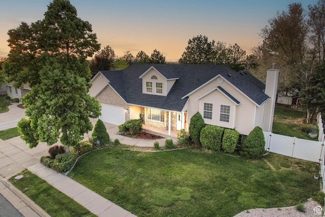 1888 W 1520 N, Clinton, UT 84015 - view of front of home featuring a gate, a chimney, stone siding, and a shingled roof