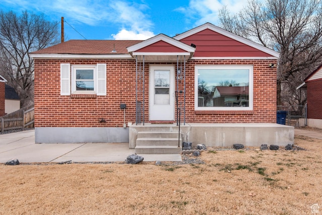 5857 S 2625 W, Roy, UT 84067 - bungalow-style home featuring brick siding and entry steps
