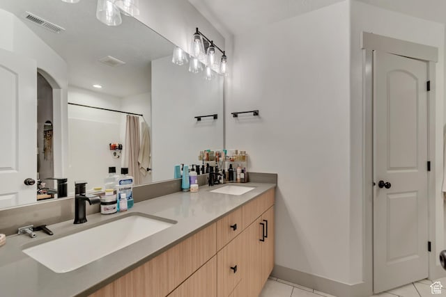 bathroom with tile patterned flooring, double vanity, a shower with shower curtain, and recessed lighting