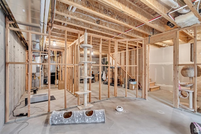 unfinished basement with stairway