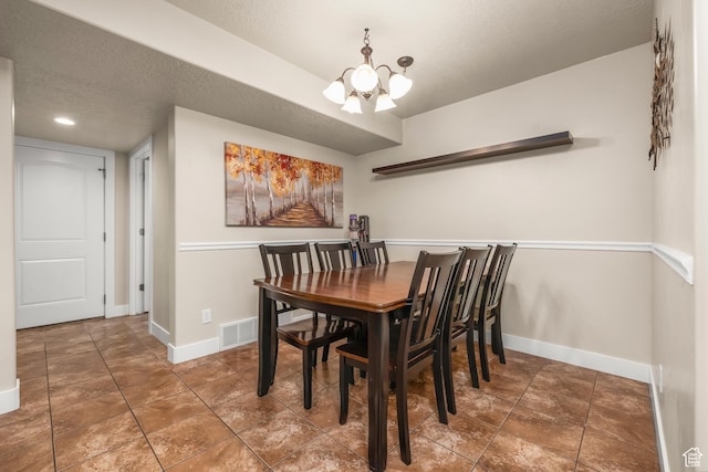 783 W 175 S, Springville, UT 84663 - dining area featuring a chandelier, baseboards, and a textured ceiling