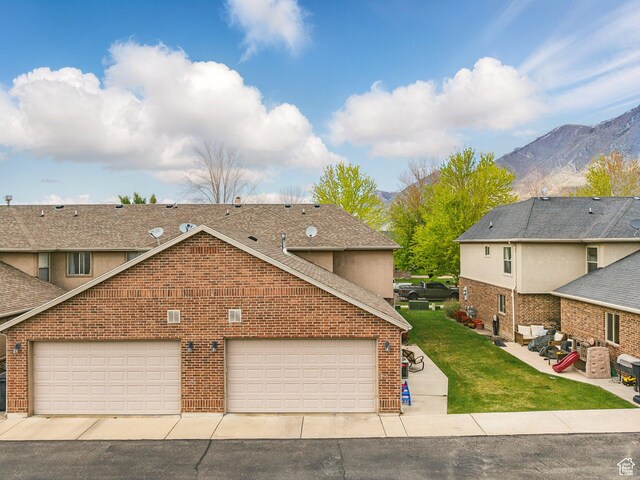 783 W 175 S, Springville, UT 84663 - traditional-style house featuring a mountain view, a front lawn, brick siding, and a shingled roof