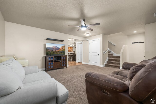 783 W 175 S, Springville, UT 84663 - living room with a ceiling fan, carpet flooring, stairs, baseboards, and a textured ceiling