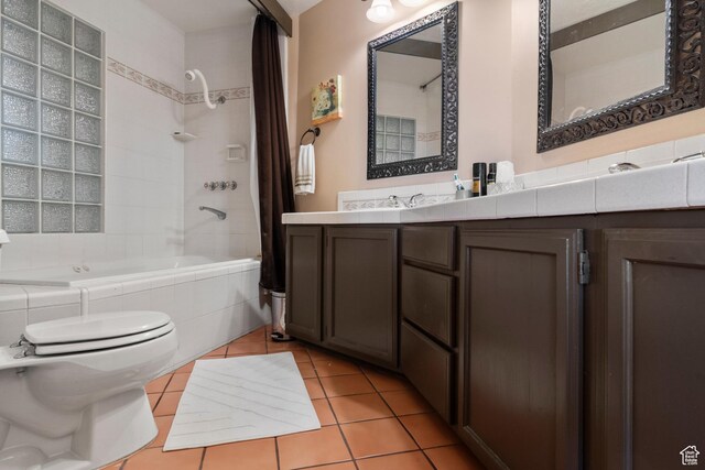 2456 E Bonneville Ter, South Ogden, UT 84403 - full bath with toilet, tiled shower / bath combo, tile patterned flooring, and vanity