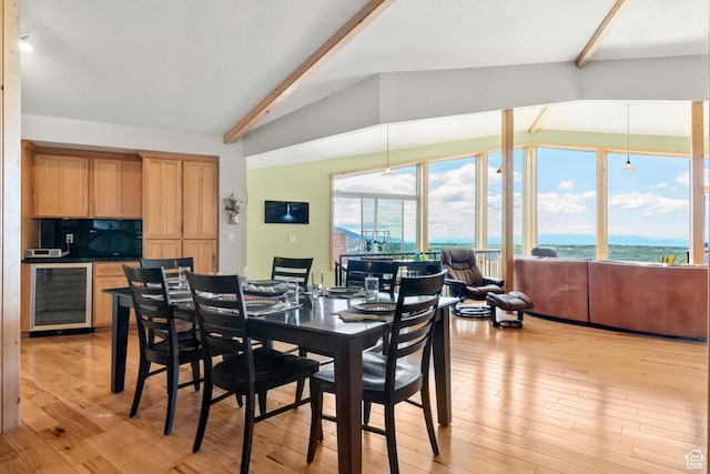 2456 E Bonneville Ter, South Ogden, UT 84403 - dining space with wine cooler, light wood-style floors, and a water view