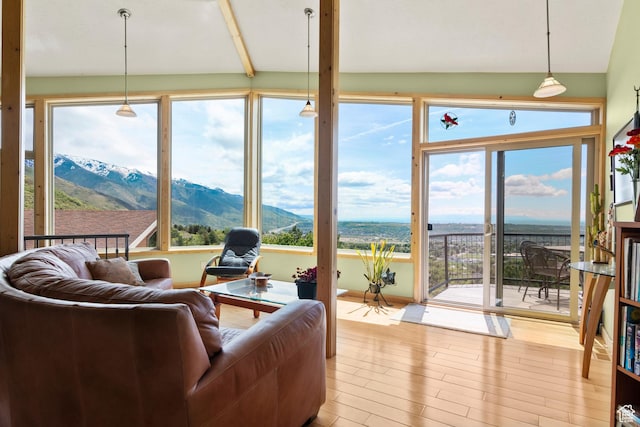 2456 E Bonneville Ter, South Ogden, UT 84403 - sunroom / solarium with wood finished floors and a mountain view