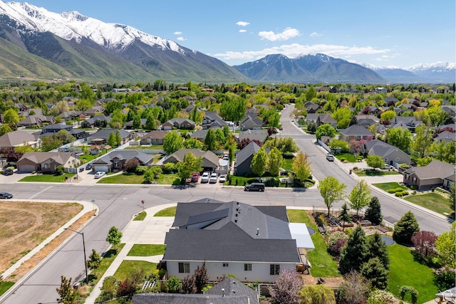 aerial view of residential area with mountains