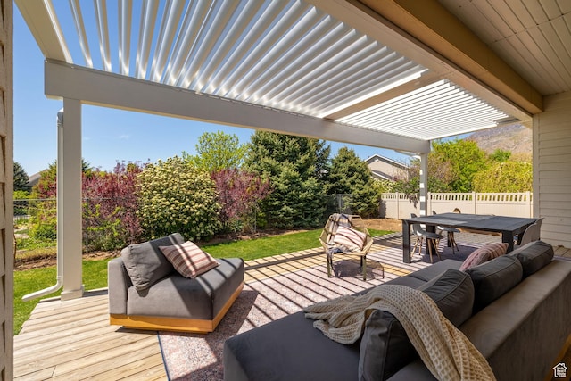 view of patio with outdoor lounge area, outdoor dining area, a fenced backyard, and a wooden deck