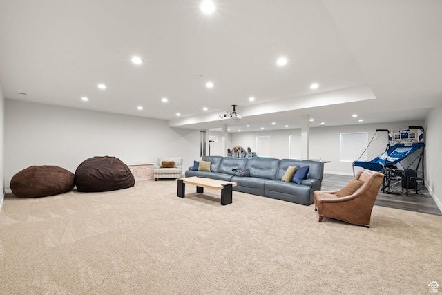 living room with carpet flooring and recessed lighting