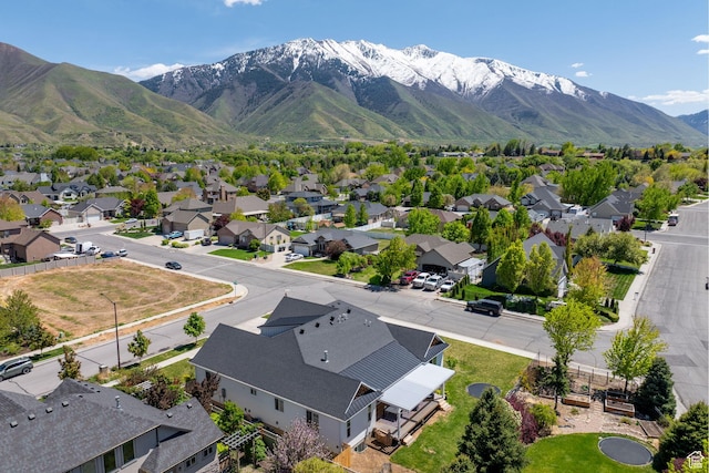 aerial perspective of suburban area with a mountainous background