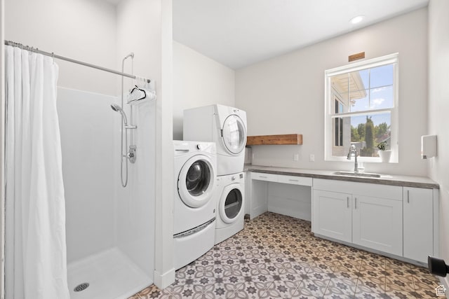 washroom featuring light floors and independent washer and dryer
