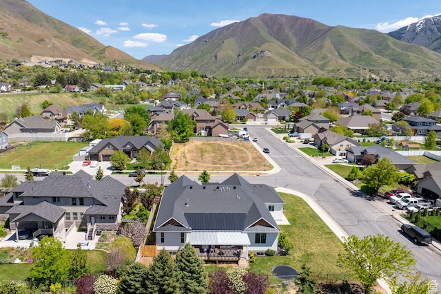 aerial perspective of suburban area with a mountainous background