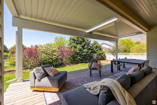 view of patio featuring an outdoor living space, a fenced backyard, outdoor dining area, and a wooden deck