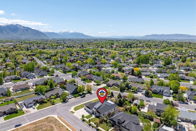 aerial view of residential area with mountains