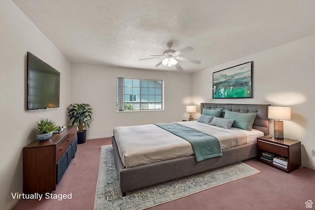 bedroom featuring carpet, baseboards, and ceiling fan