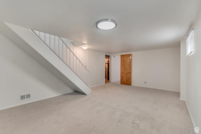 3400 S 2000 E, Millcreek, UT 84109 - below grade area with light carpet, stairway, and baseboards