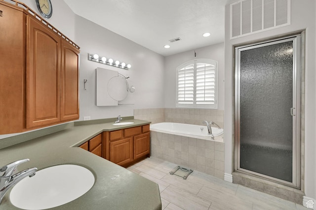 337 S 300 E, Willard, UT 84340 - full bathroom featuring a stall shower, a bath, vanity, recessed lighting, and tile patterned floors