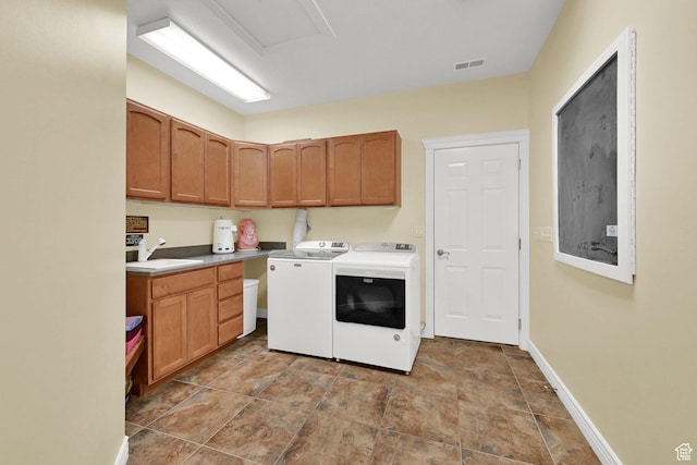 337 S 300 E, Willard, UT 84340 - laundry room featuring washing machine and dryer, cabinet space, stone finish flooring, and baseboards